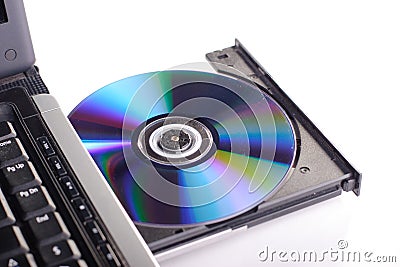 Laptop with DVD disc Stock Photo