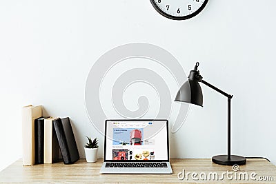 laptop with ebay website on screen on work desk Editorial Stock Photo