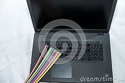 Laptop and fiber optic cable - detail Stock Photo