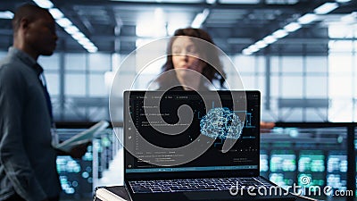 AI driven notebook used for overseeing server clusters, close up Stock Photo