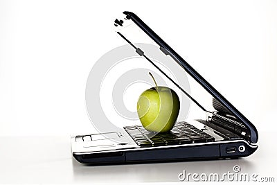 Laptop and green apple Stock Photo