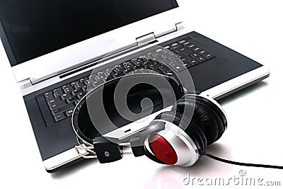 Laptop, headphones Stock Photo