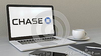 Laptop with JPMorgan Chase Bank logo on the screen. Modern workplace conceptual editorial 3D rendering Editorial Stock Photo