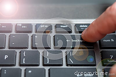 Laptop keyboard close up, backspace button pressing a lot of times on keyboard Stock Photo