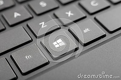 9/27/19 Nizhniy Novgorod, Russia. Laptop keyboard of computer running Windows 10 operating system, close-up macro start key Editorial Stock Photo