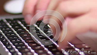 Laptop Keyboard. Man typing on keyboard MacBook Pro laptop. Sending a message via email. Good for a corporate technology edition Laptop Keyboard. Man typing on keyboard MacBook Pro laptop. Sending a message via email. Good for a corporate technology edition