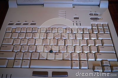 Laptop keyboard vintage tech backdrop Stock Photo