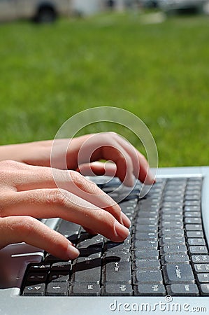 Laptop in the Lawn Stock Photo