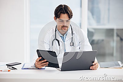 Laptop, man or doctor on tablet for research, medical update or telehealth web service in clinic. Reading news info, PC Stock Photo