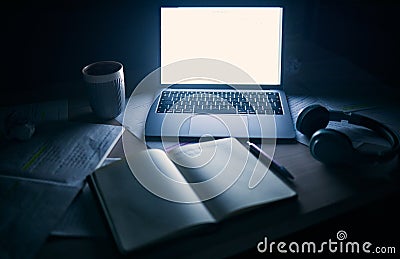 Laptop, mock up and study on table in dark student dormitory, room and technology. Background of computer space, blank Editorial Stock Photo