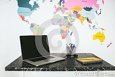 Laptop and notebook on the table Stock Photo