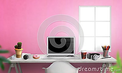 Laptop on office desk. Plant, camera, paper, pens, coffee, donut, headset on table Stock Photo