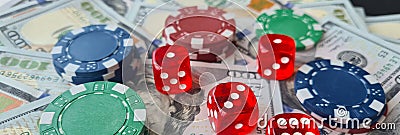 Laptop online casino and poker. Laptop keyboard and chips with dice and money cash dollars on green game table Stock Photo