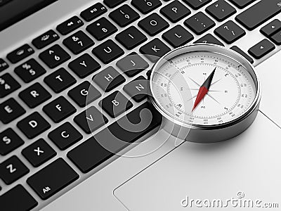 Laptop and retro compass Stock Photo