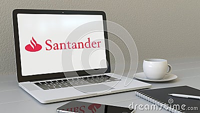 Laptop with Santander Serfin logo on the screen. Modern workplace conceptual editorial 3D rendering Editorial Stock Photo