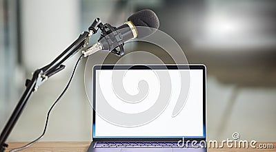 Laptop screen, mockup and mic for radio or podcast with audio equipment, technology and marketing for show. Multimedia Stock Photo