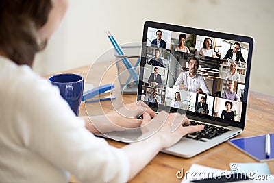 Laptop screen view diverse businesspeople involved at group videocall Stock Photo