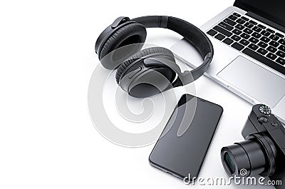 Laptop, smartphone, camera and headphone Stock Photo