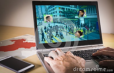 Laptop with street image and facial recognition in China Stock Photo