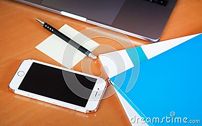 Laptop with tablet and smart phone on table Stock Photo