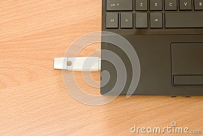 Laptop on Wooden Table Stock Photo