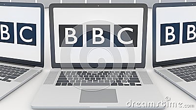 Laptops with British Broadcasting Corporation BBC logo on the screen. Computer technology conceptual editorial 3D Editorial Stock Photo