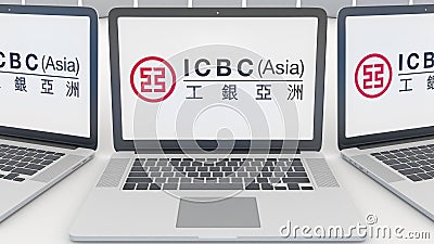 Laptops with Industrial and Commercial Bank of China ICBC logo on the screen. Computer technology conceptual editorial Editorial Stock Photo