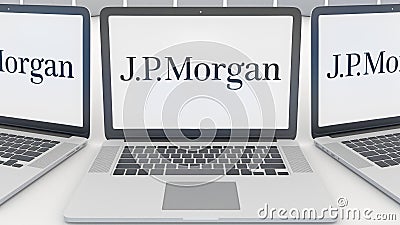 Laptops with J.P. Morgan logo on the screen. Computer technology conceptual editorial 3D rendering Editorial Stock Photo