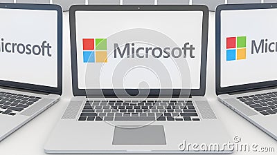 Laptops with Microsoft logo on the screen. Computer technology conceptual editorial 3D rendering Editorial Stock Photo