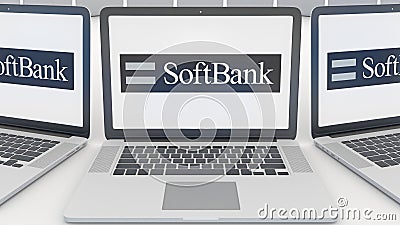 Laptops with SoftBank logo on the screen. Computer technology conceptual editorial 3D rendering Editorial Stock Photo