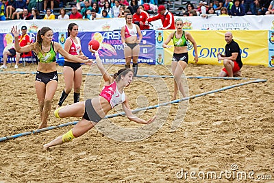 LAREDO, SPAIN - JULY 31: Unidentified girl player launches to goal in the Spain handball Championship celebrated in Laredo in July Editorial Stock Photo