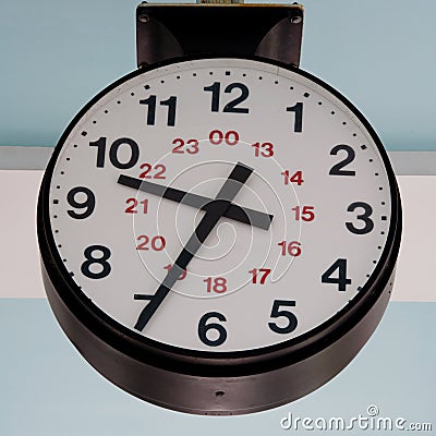 Large 24 hour clock outdoors Stock Photo