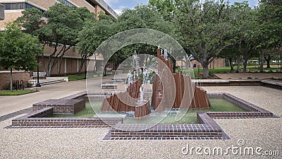 Large abstract steel fountain on the campus of the University of Texas at Arlington. Editorial Stock Photo