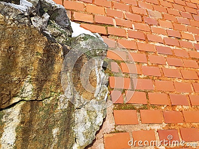 Large aged stone and red brick wall. Large aged stone and red brick wall Stock Photo