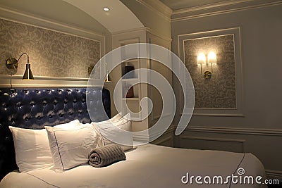 Gorgeous suite with comfortable bed and soft lighting, The Adelphi Hotel, Saratoga Springs, New York, 2018 Editorial Stock Photo