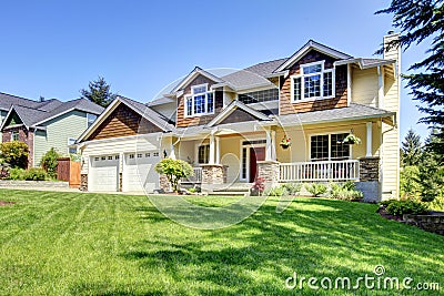 Large American beautiful house with red door. Stock Photo