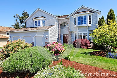 Large American grey house front exterior. Stock Photo