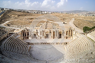 large amphitheater in the ancient Roman city of Gerasa in Jarash, Jordan. Ancient ancient ruins of the Roman era on the background Stock Photo