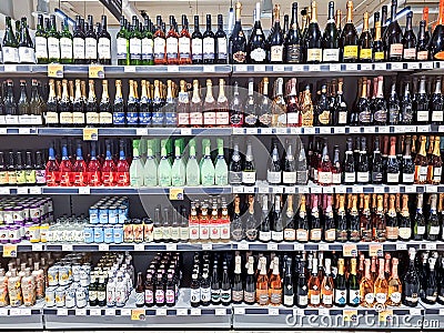 Large assortment of alcoholic beverages high quality of different manufacturers in STOCKMANN shopping mall Editorial Stock Photo