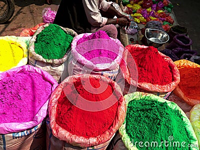 Large bags of powder for holi at the spice market of chandni chowk Stock Photo