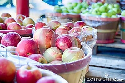 Large basket full of fresh locally grown red apples at lo Stock Photo