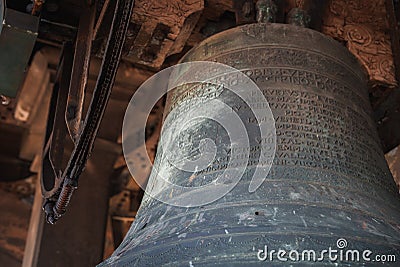 Large bell inside historic building in Venice, Italy - architectural details not visible Stock Photo
