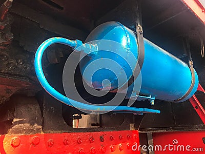 Large blue iron metal cylindrical industrial tank. Gas cylinder for storage of liquefied gas under pressure Stock Photo