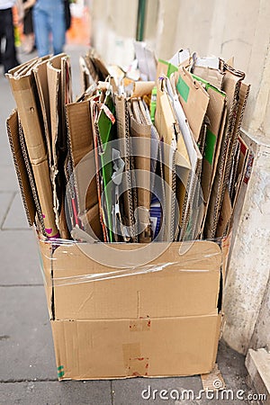 A large box of folded up cardboard boxes set outside a residence in Rome, Italy for garbage recycling pick up Stock Photo