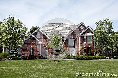 Large brick home in suburbs Stock Photo