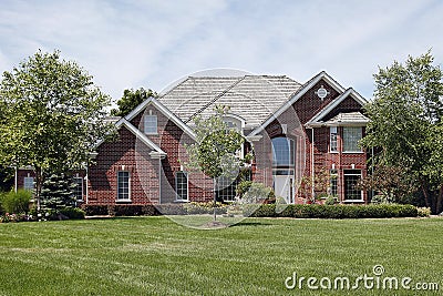 Large brick home in suburbs Stock Photo