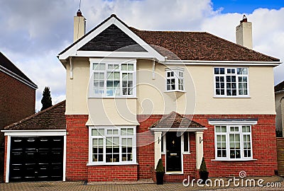 Large brick and rendered detached house Stock Photo