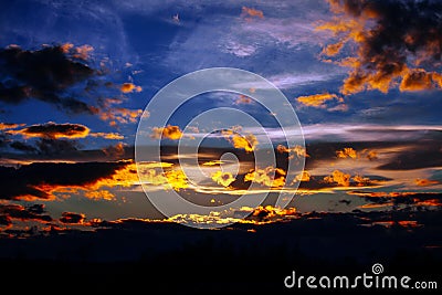 Beautiful sky twilight time sunset clouds orange blue yellow mood peace calm peaceful landscape Stock Photo