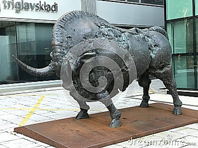 A large bronze bull sculpture at the intersection of Slovenska cesta & Trdinova ulica in Ljubljana, Slovenia. Editorial Stock Photo