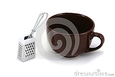 Large Brown Cappuchino Mug with Whisk and Grater Stock Photo